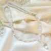 02_7e0a4dfa-53c9-478d-ba29-06e72f35997d.jpg Crystal Pearl Beaded Curtain Tieback – Elegant Twisted Rope Design
