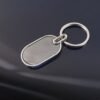 Oval Metal Keychain – Elegant Black & Silver Finish for Everyday Use