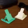 Mobile Phone Stand – Adjustable Foldable Plastic Holder Set (2 Pc)