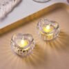 02_ce2b95ae-faea-46bc-8956-09f42962b78d.jpg Heart-Shaped LED Flameless Candles – Set of 12 Elegant Lights