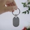Oval Metal Keychain – Elegant Black & Silver Finish for Everyday Use