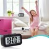 04_6005e2ae-2441-4bb6-a451-122b64ecfeb3.jpg Digital LCD Alarm Clock – Backlit Display with Time & Temperature