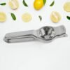 04_8b7c3252-0aeb-4679-af66-f5ac0bc7e629.jpg Stainless Steel Lemon Press – Heavy Duty Juicer with Ergonomic Handle