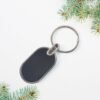 Oval Metal Keychain – Elegant Black & Silver Finish for Everyday Use