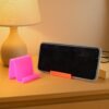 05_fb559409-6fe2-4f70-a320-641f5f57c29f.jpg Mobile Phone Stand – Durable Plastic with Angled Support (2 Pc, Mixed Colors)