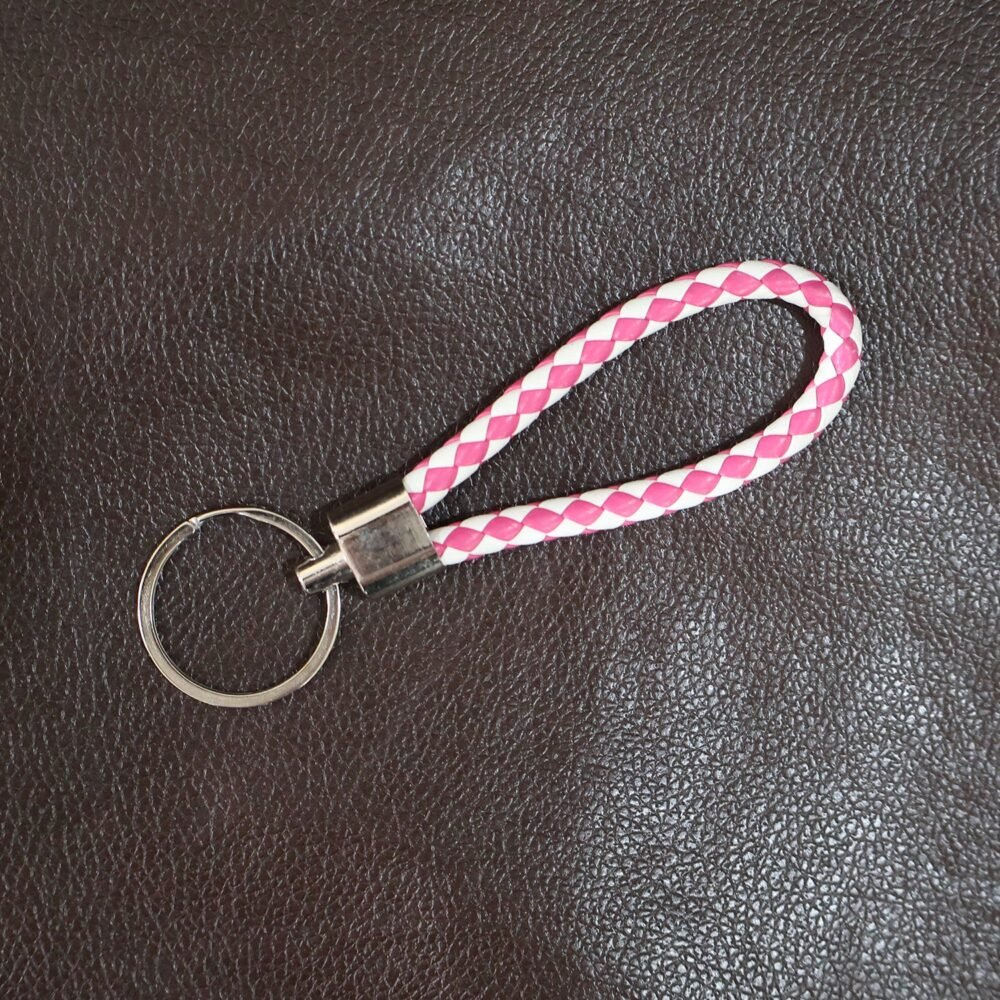 06_0f3d5203-298c-41a9-8d33-d35d61fdf2a2.jpg Braided Leather Keychain – Durable Metal Ring & Stylish Hand Strap
