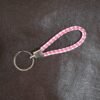 06_0f3d5203-298c-41a9-8d33-d35d61fdf2a2.jpg Braided Leather Keychain – Durable Metal Ring & Stylish Hand Strap