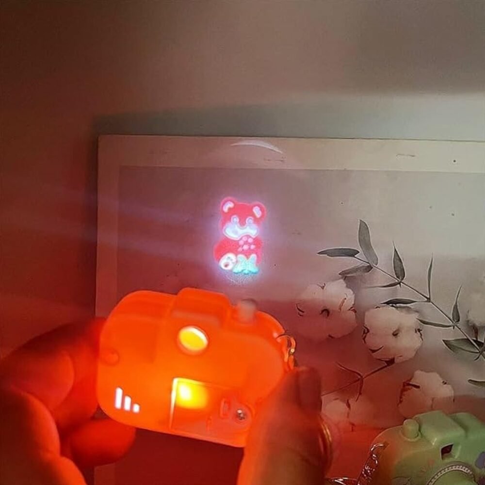 08_278ae3d2-8919-4360-8b19-c1889cd2193f.jpg Projective Camera Keychain – Fun Rainbow Image Projector