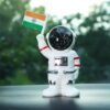 08_6b4c7402-fe36-42ed-919c-5dec770c73bc.jpg Solar Power Astronaut Ornament – Indian Flag Car Dashboard Décor