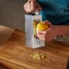 Stainless Steel 5-in-1 Grater and Slicer – Durable Kitchen Tool