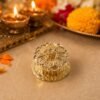 09_b3b226ee-3f05-4f2a-bdfd-111cf311f992.jpg Golden Pooja Kankavati – Elegant Religious Storage Container