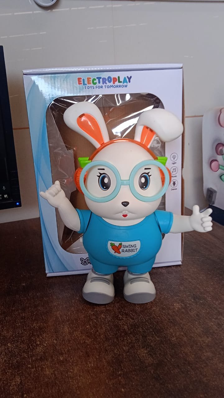 0dd2cf5b-e7c8-49e8-8654-db974858b841.jpg Swing Rabbit Musical Dancing Toy – LED Lights & Fun Music