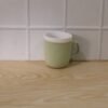 11387-04-product_3509cb12-2d1d-47a0-a648-3a4fdf56d5a4.jpg Plastic Coffee Mug with Handle – Leather-Textured Reusable Cup