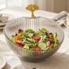 17123-08-live_38749e63-8a9a-418e-a619-02593f70ce13.jpg Decorative Plastic Fruit Bowl – Elegant Gold Accent for Dining