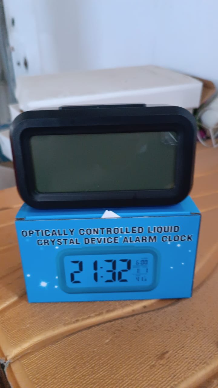 1a88d6be-8f99-48cf-a917-317ed7092e6e.jpg Digital LCD Alarm Clock – Backlit Display with Time & Temperature