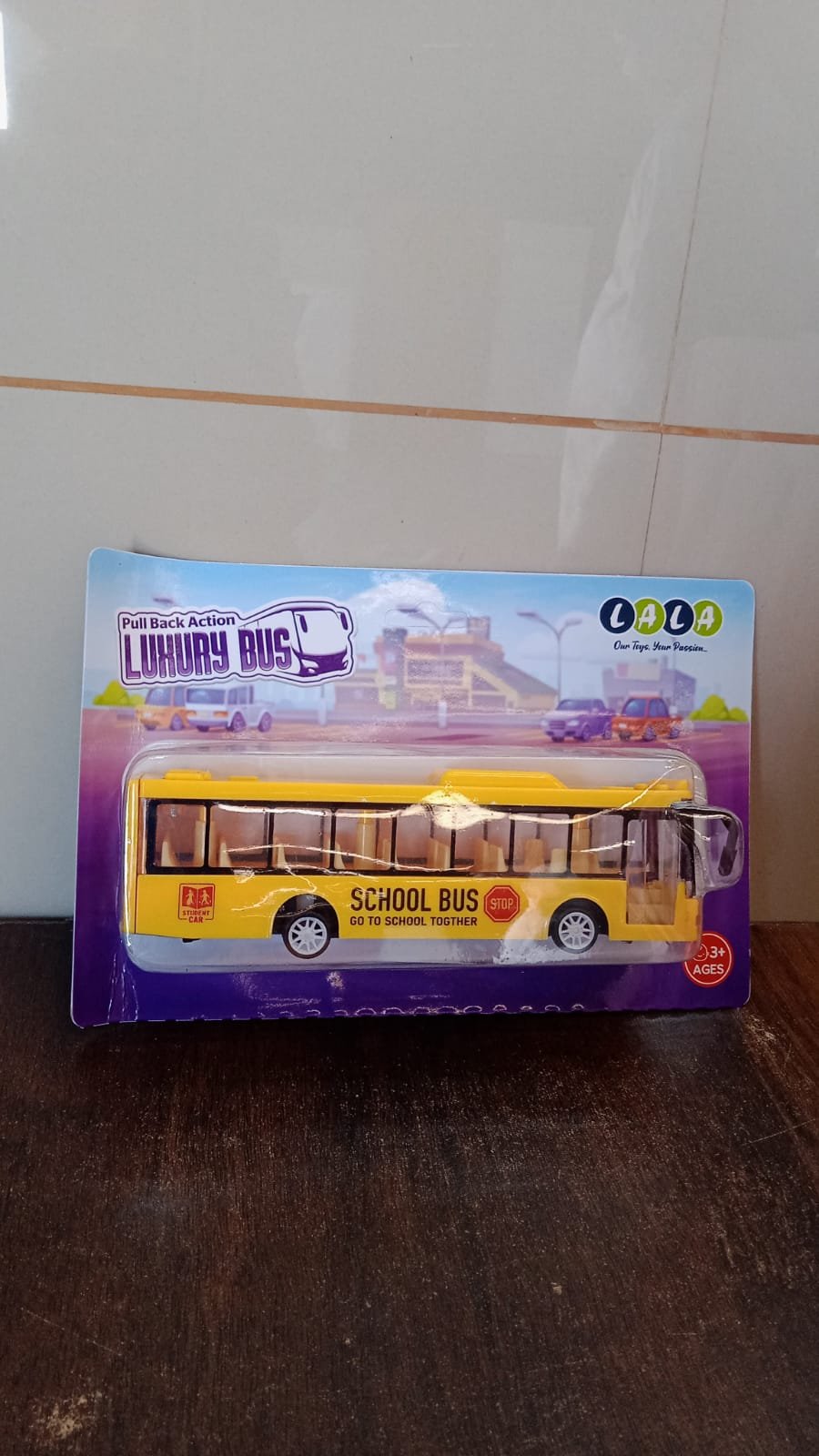 24e1b27d-bba5-4332-a84d-d11798fe6409.jpg Yellow Mini Bus Toy – Realistic Details & Durable Plastic