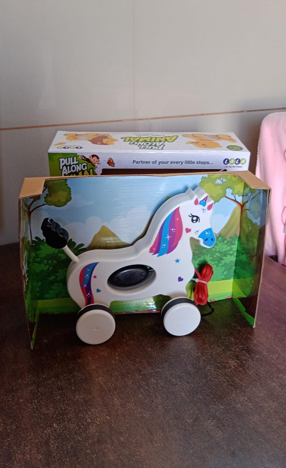 5bee6744-1a8b-4f50-bcb4-564310ff67f2.jpg Unicorn Pull Along Toy – Encourages Toddler Walking & Motor Skills