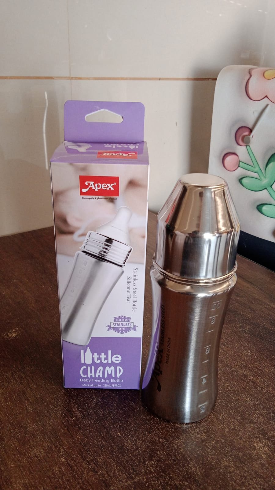 6a1cd3d7-4f29-4454-baae-09f6813e895a.jpg Stainless Steel Baby Feeding Bottle – 250ml Durable & Anti-Colic