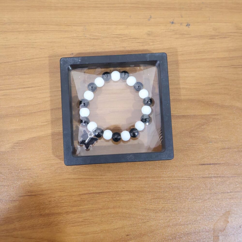Black & White Beaded Bracelet with Cross Pendant – Elegant Style