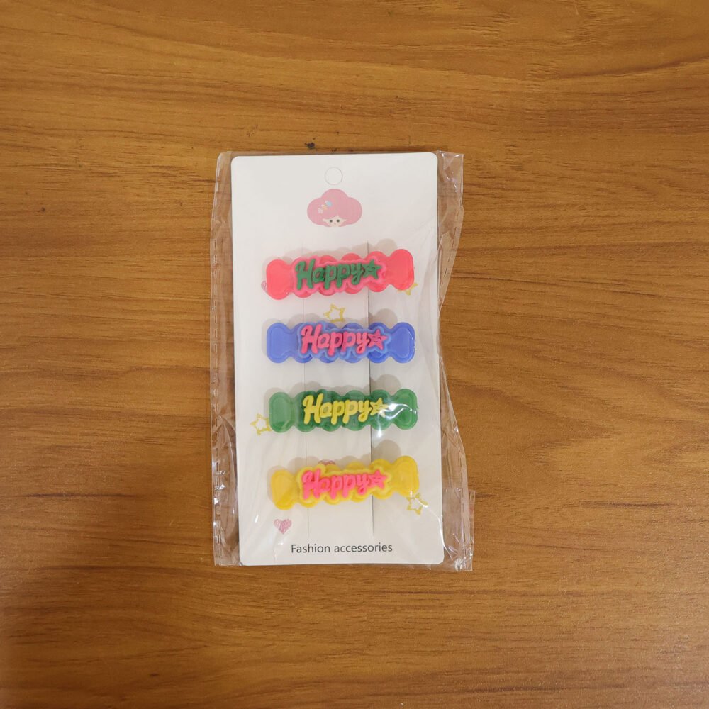 HappyStarHairClip-live.jpg Happy Bone-Shaped Snap Hair Clips – 4 Vibrant Pieces for Girls