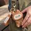 Labubu-Boom-Coin_2_-3.jpg Mini Silicone Pouch Keychain – Cute Cartoon Style for Daily Use