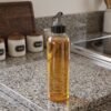 PlasticOilDispenser-06.jpg Oil Dispenser Bottle with Flip Top Spout – 900ml, Leakproof & Easy to Use