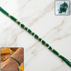 Rakhi01-01_f0c27e0a-a4ec-4190-a7b9-fab190912aec.jpg Traditional Green Pearl Beaded Rakhi – Handmade Festive Bracelet