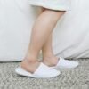 WhiteDisposableSlippers-02.jpg Disposable Hotel Slippers – Hygienic Single-Use Guest Footwear