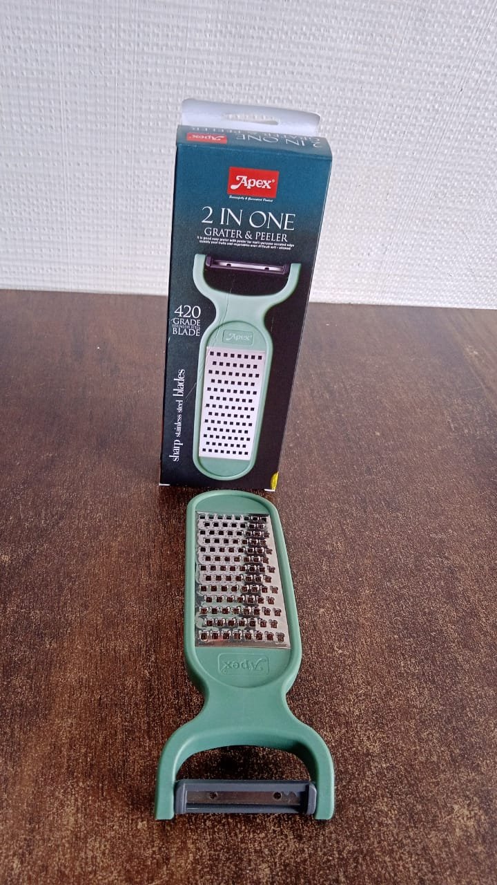 cb45d632-1e92-4ff7-a3a1-ed482fbd1e79.jpg Vegetable Grater – 2-in-1 Peeler & Stainless Steel Cutter