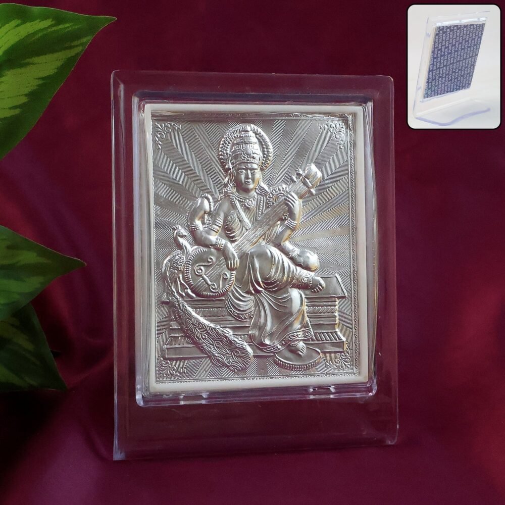 decorative-photo-frame-01_680158e2-3b2b-4a9f-8f27-5576e2b652fa.jpg Silver Saraswati Maa Photo Frame – Elegant Spiritual Decor