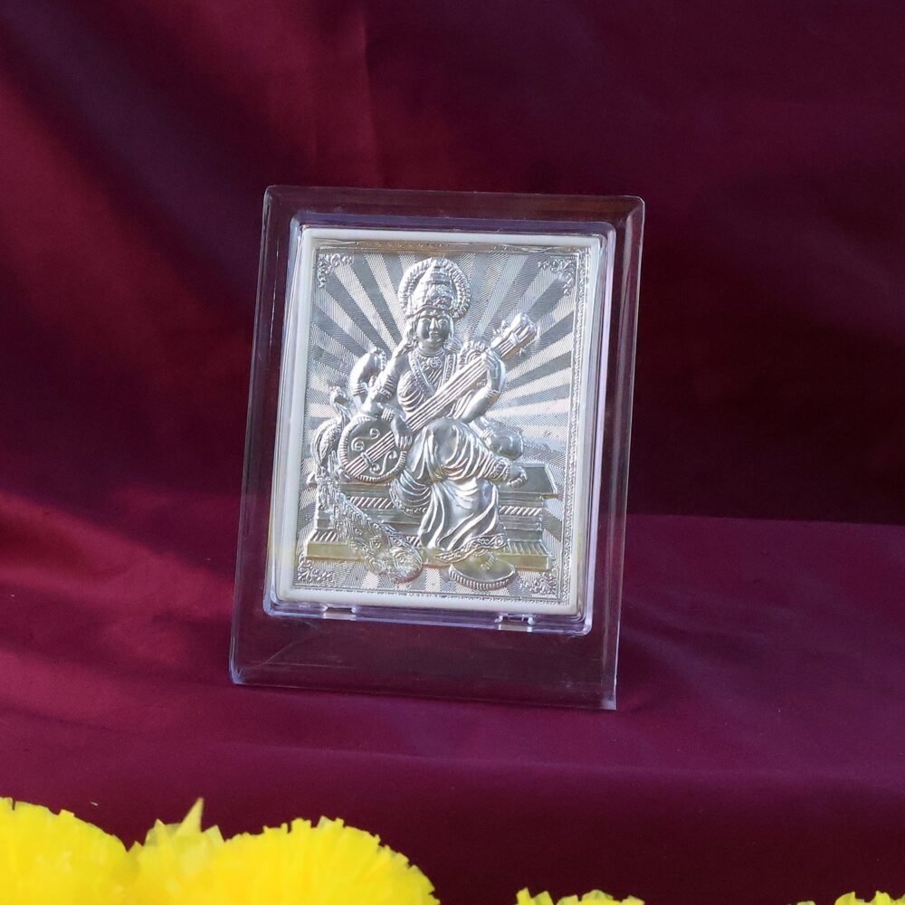 decorative-photo-frame-02_60f99067-729b-4401-9d91-ddb6ab8bf86f.jpg Silver Saraswati Maa Photo Frame – Elegant Spiritual Decor