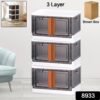 fbc6c4eb-8517-406a-b84d-42d5acbffd90.jpg Plastic Folding Wardrobe Organizer – 3-Layer Storage with Wheels