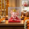 ganesh1.jpg Hand-Moving Small Ganesha Idol – Vibrant Red & Gold Decor