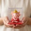 ganesh2.jpg Hand-Moving Small Ganesha Idol – Vibrant Red & Gold Decor