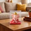 ganesh3.jpg Hand-Moving Small Ganesha Idol – Vibrant Red & Gold Decor
