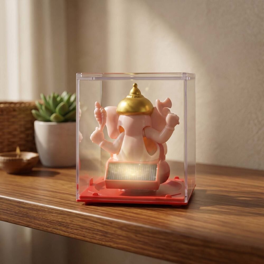 ganesh5.jpg Hand-Moving Small Ganesha Idol – Vibrant Red & Gold Decor