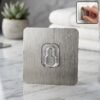 Adhesive Plastic Wall Hook – Strong Hold & Reusable Design