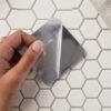 Adhesive Plastic Wall Hook – Strong Hold & Reusable Design