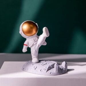 01_8d5c4877-a713-4aef-b859-ac071f6bf21d.jpg Astronaut Phone Holder – 3D Spaceman Design, Resin | PHOBIA