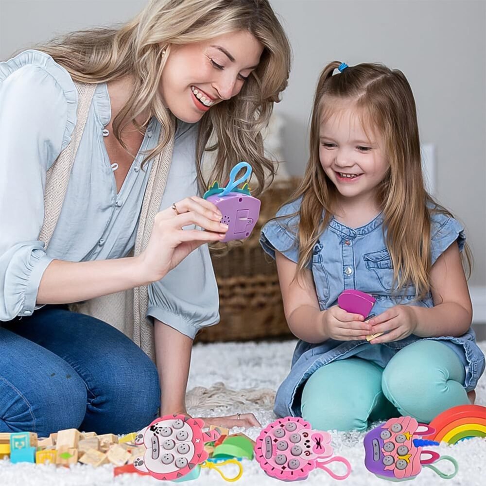 02_751890d6-7718-449d-a2e3-d060e39e7ad3.jpg Mini Push Bubbles Game – Music & Memory Keychain | Play Mancer