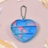 03_85976623-b4b2-43c9-b1ca-aba43572c4c8.jpg Mini Fidget Keychain – Pop Sensory Toy for Kids & Adults | Styleva