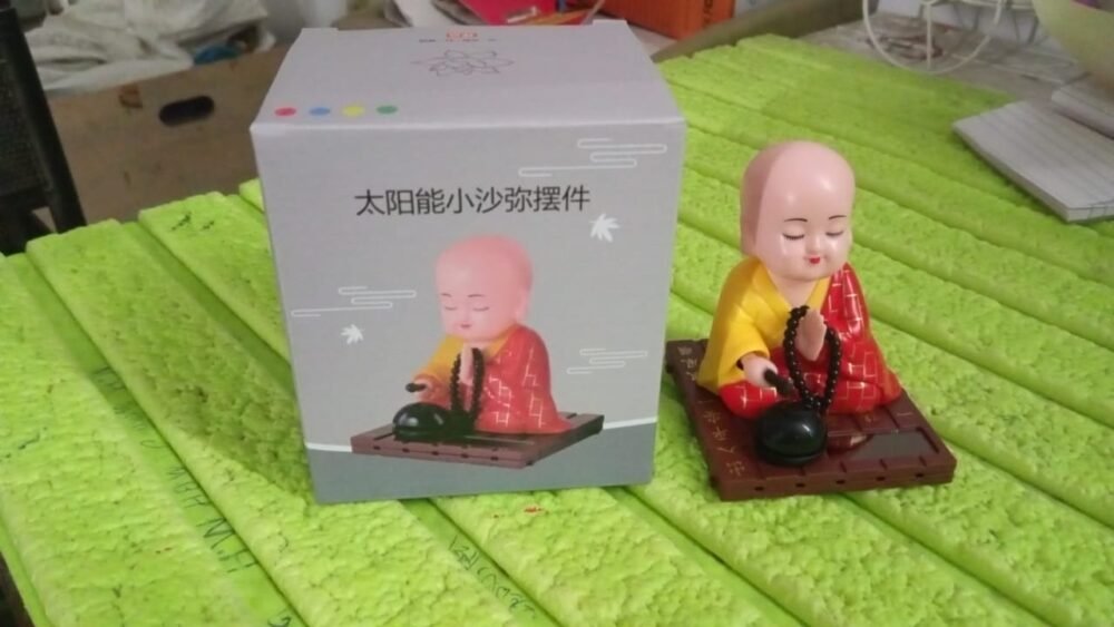 Solar Buddha Statue – Moving Head & Hand Decor | XcelCraft