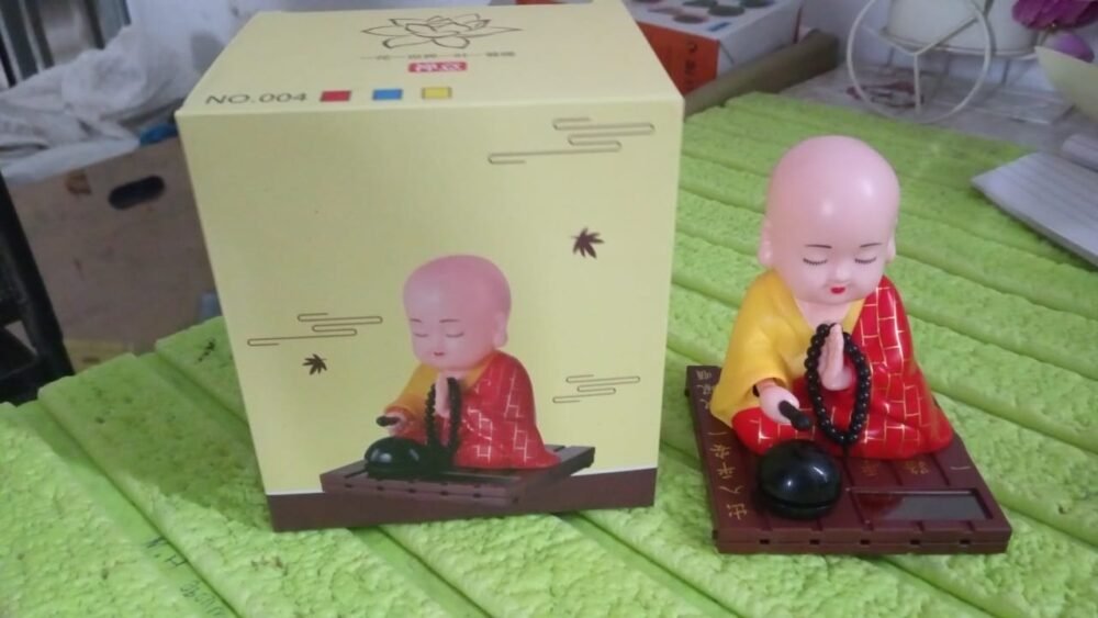 Solar Buddha Statue – Moving Head & Hand Decor | Styleva