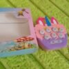 c8f79ffd-fc65-47f6-9718-8eaf0ef1e949.jpg Mini Push Bubbles Game – Music & Memory Keychain | Play Mancer